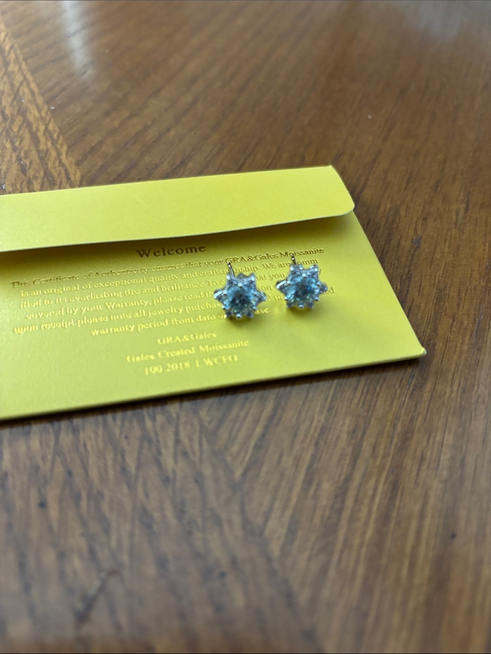 Classic Silver Floral Stud Earrings with Moissanite stones. Brand new.